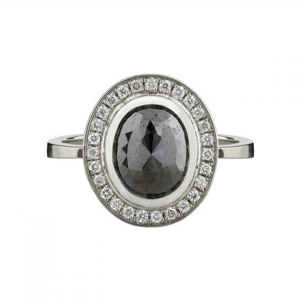 18ct white gold and black rose-cut diamond and white diamond halo ring
