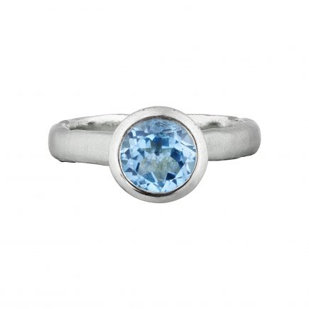 Silver and round Blue Topaz Molten ring