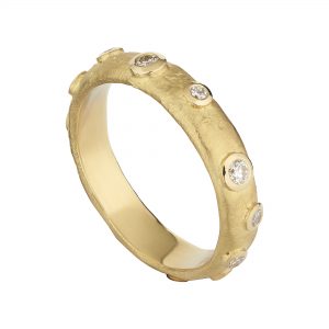18ct yellow gold and round rubover-set round diamond Molten eternity ring