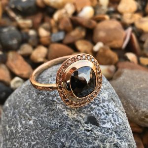 18ct rose gold and rose-cut black diamond and champagne diamond Halo ring