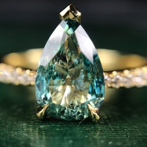 18ct yellow gold and pear shaped blue diamond ring