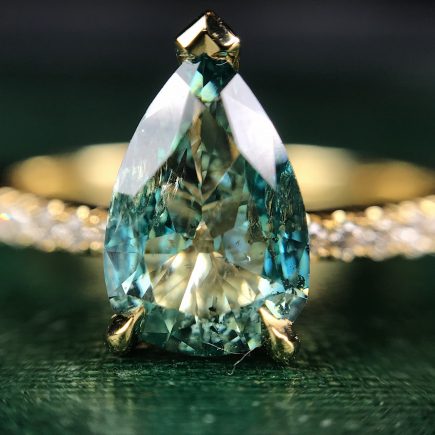 18ct yellow gold and pear shaped blue diamond ring