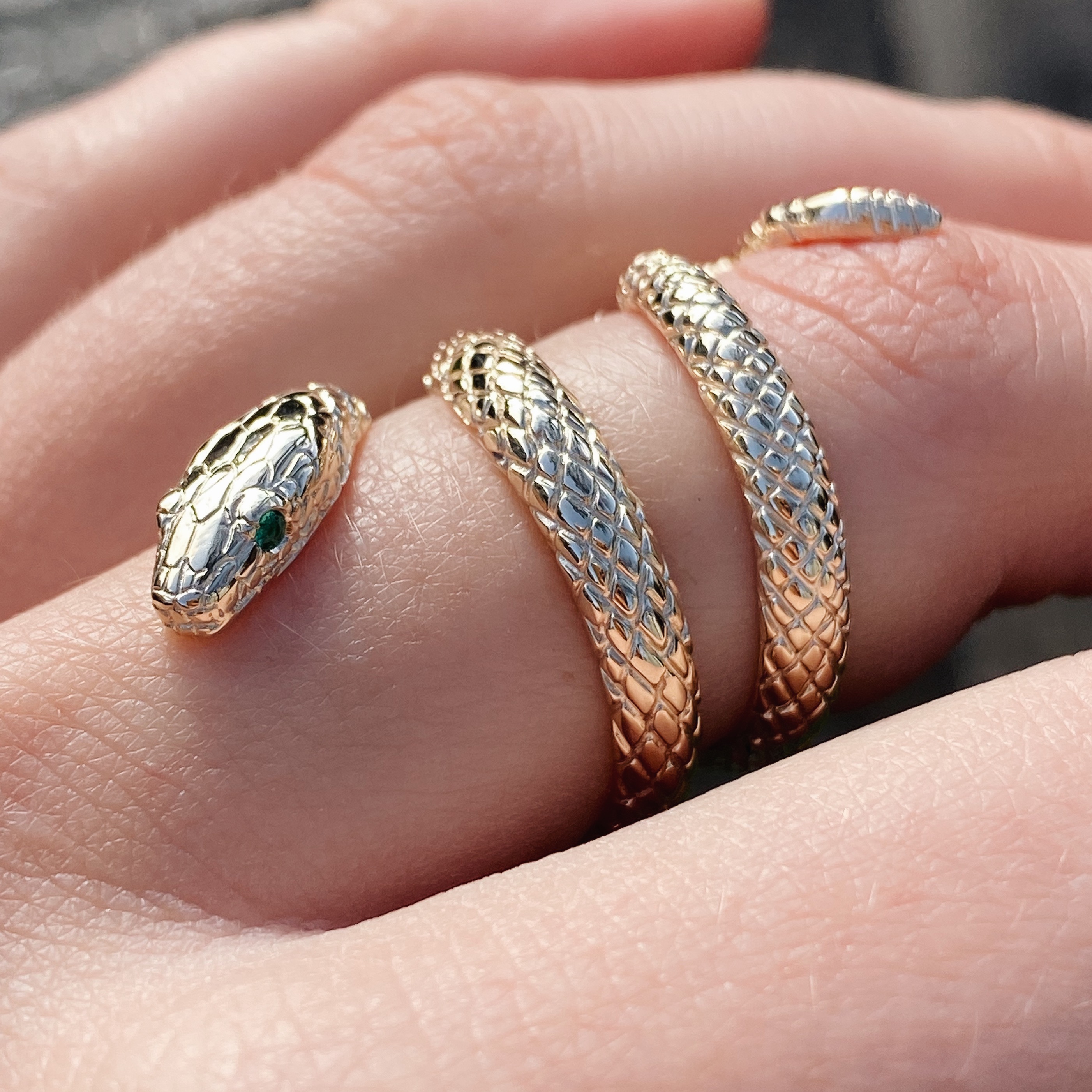 9ct yellow gold snake ring with emeraldset eyes Baroque Bespoke Jewellery