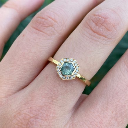 18ct yellow gold hexagon Montana sapphire Halo ring