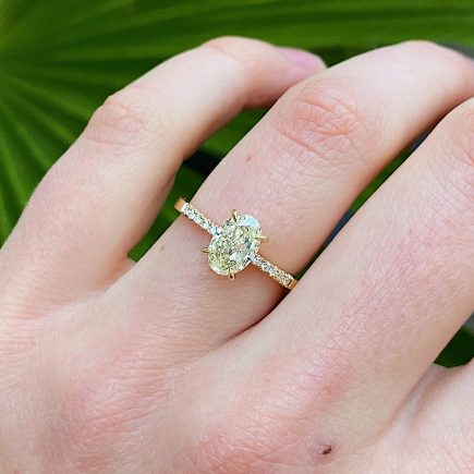 18ct Yellow Gold and Oval Yellow Diamond ring with Diamond Shoulders