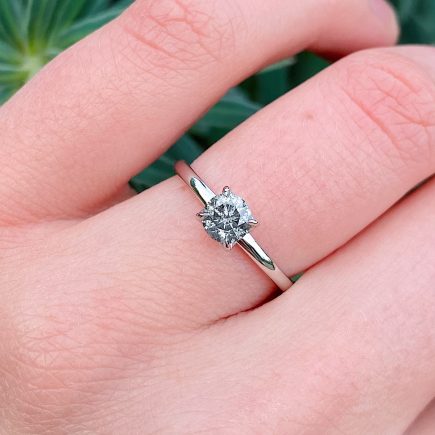 Platinum salt and pepper diamond solitaire tulip ring