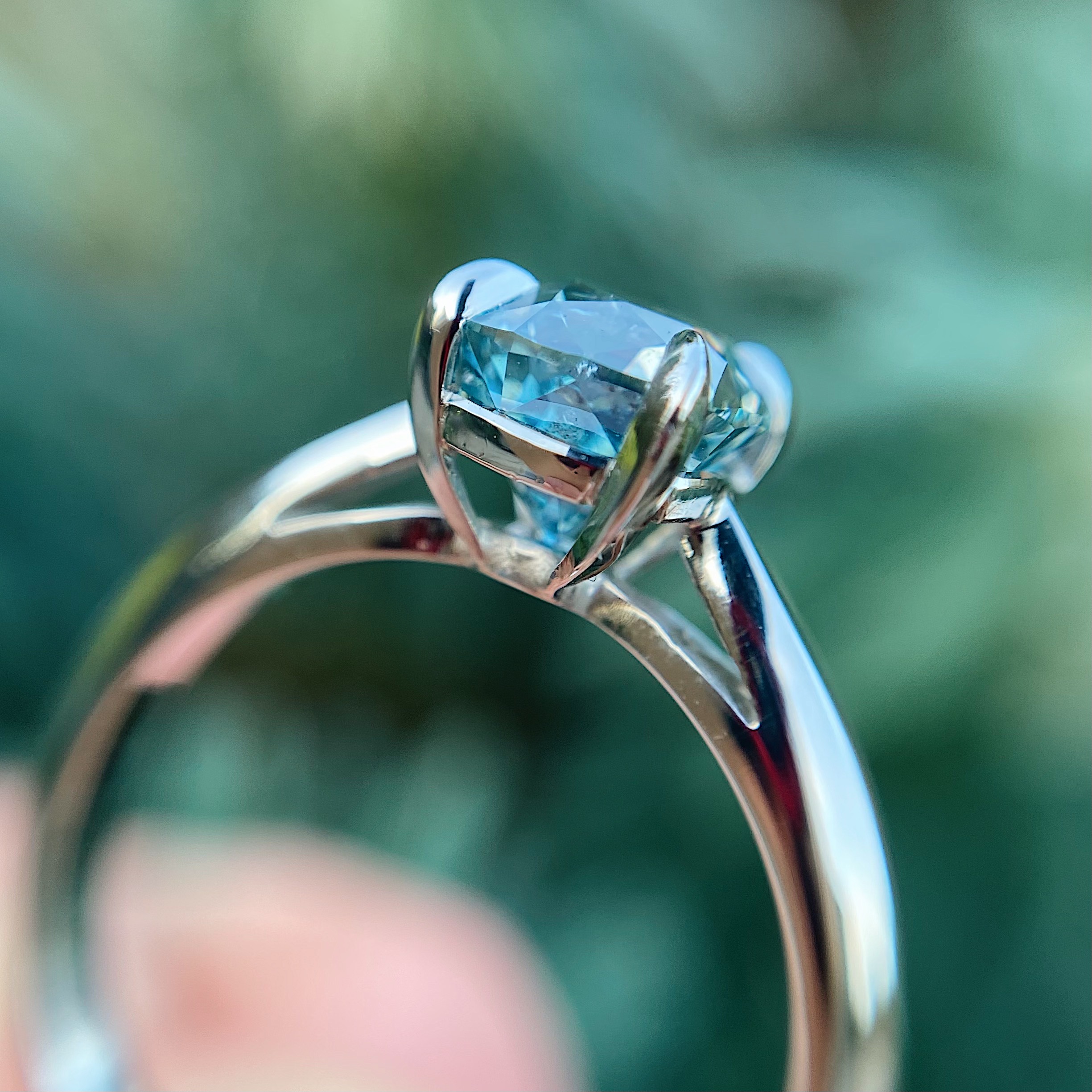 Platinum and cushioncut treated blue diamond engagement ring Baroque