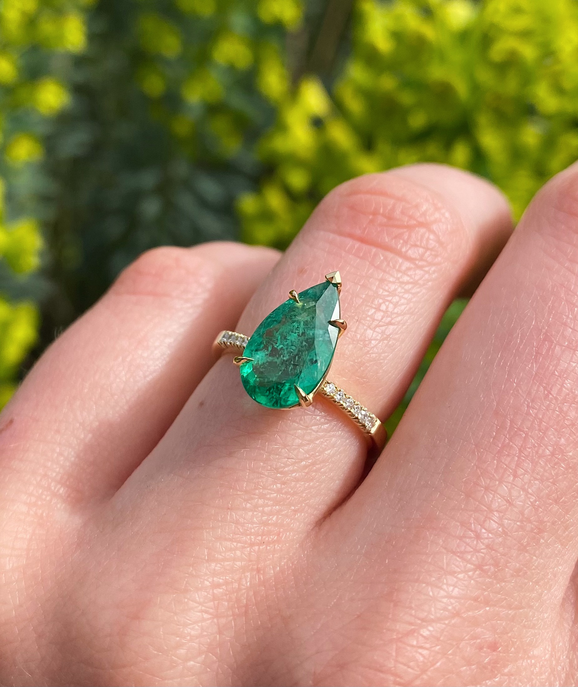 18ct yellow gold and Brazilian pear-shaped emerald engagement ring with ...