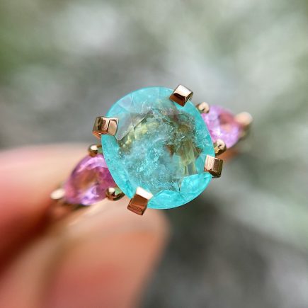 18ct rose gold Paraiba Tourmaline Coco Trilogy engagement ring with pink sapphire shoulders