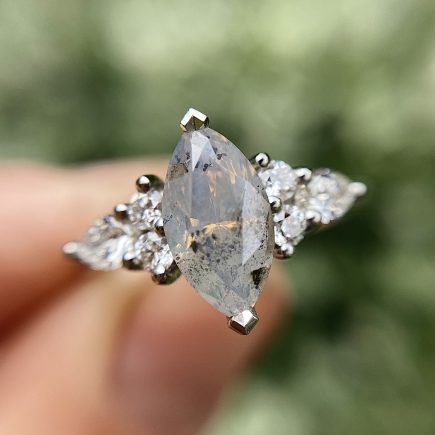 Platinum Unicorn Marquise Diamond Ring with White Diamond shoulder detail