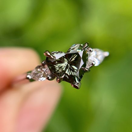 Platinum and Heart Shape Green Diamond Ring with White Diamond Shoulders