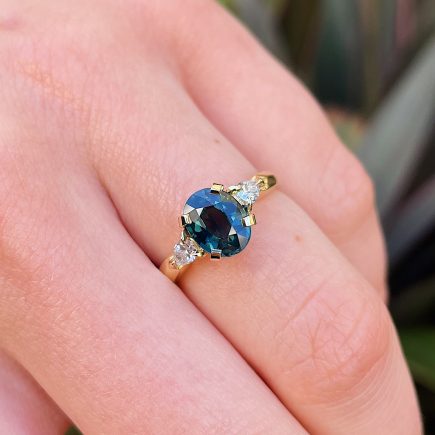 18ct Yellow Gold Teal Sapphire Coco Trilogy Ring with Diamond Shoulders