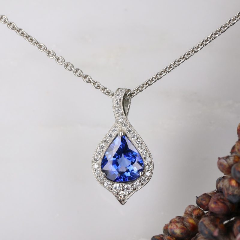 Platinum, pear-shaped sapphire and diamond atlantis pendant