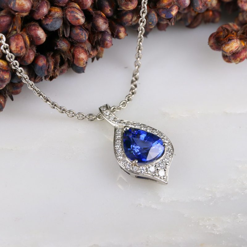 Platinum, pear-shaped sapphire and diamond atlantis pendant