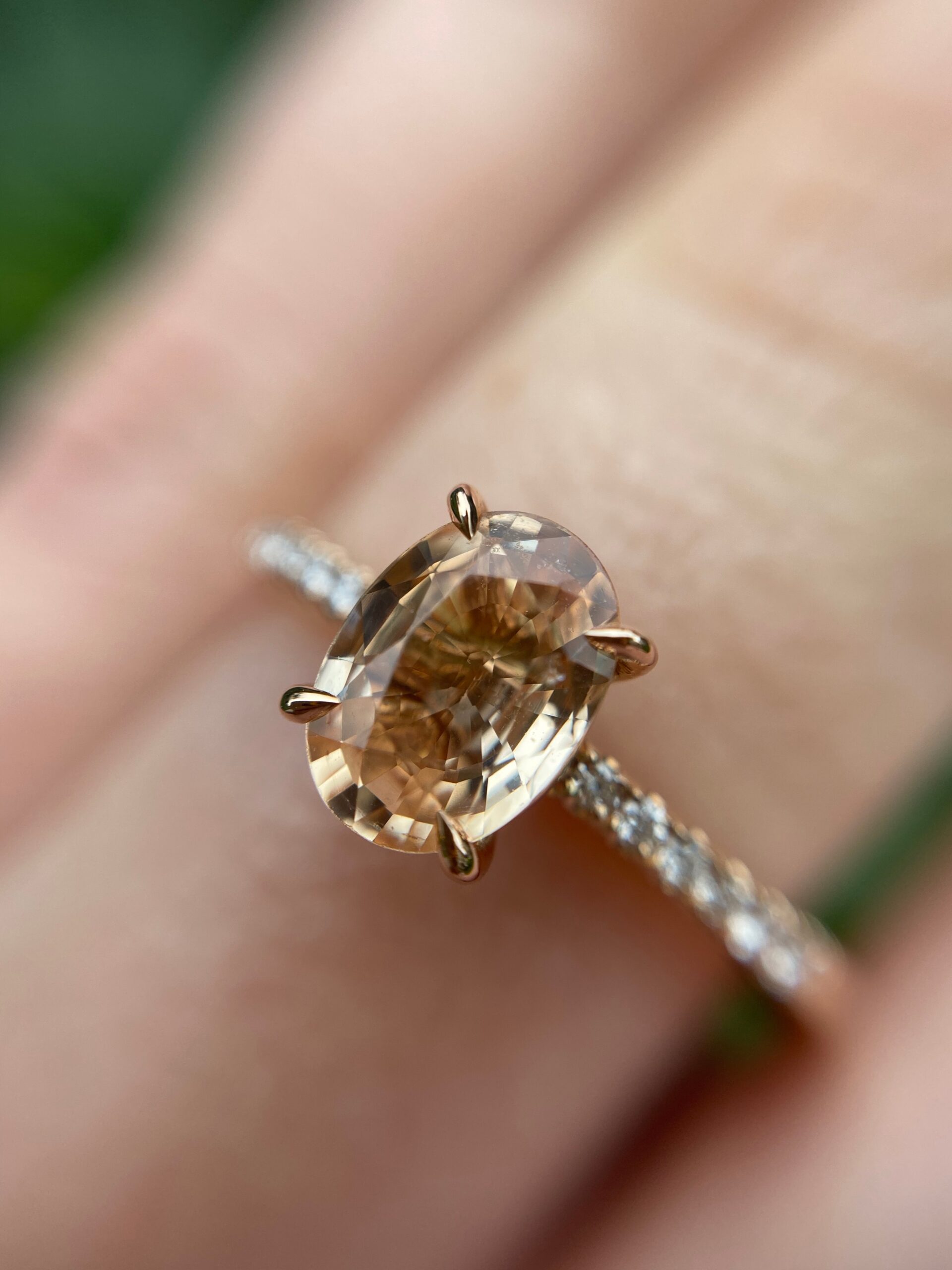 18ct rose gold and oval peach sapphire engagement ring with