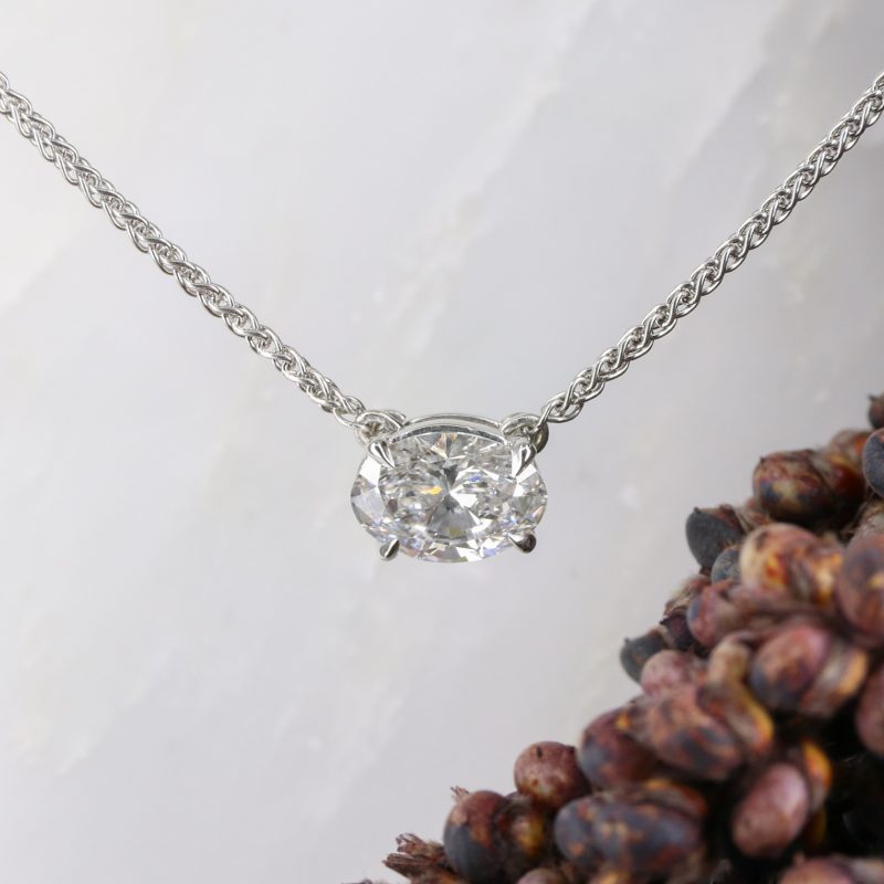 Platinum and 1.14ct oval lab grown diamond pendant