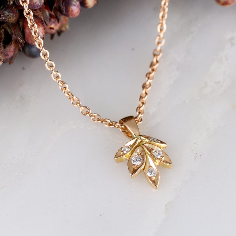 18ct rose gold rose and thorn pendant
