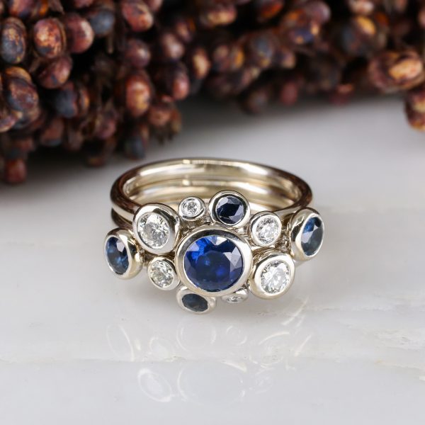 18ct white gold three part concentric ring with blue sapphires and white diamonds