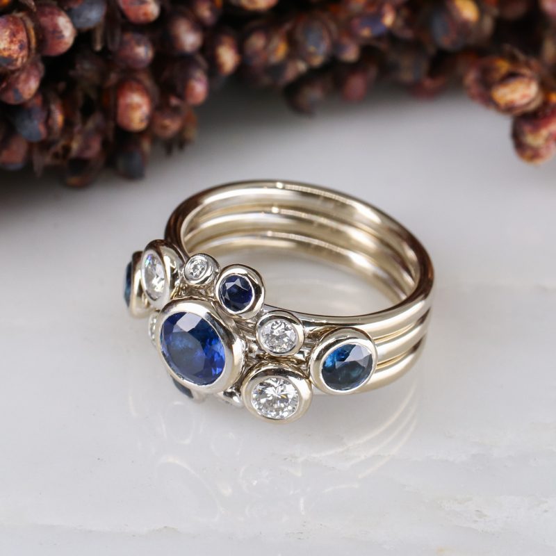 18ct white gold three part concentric ring with blue sapphires and white diamonds