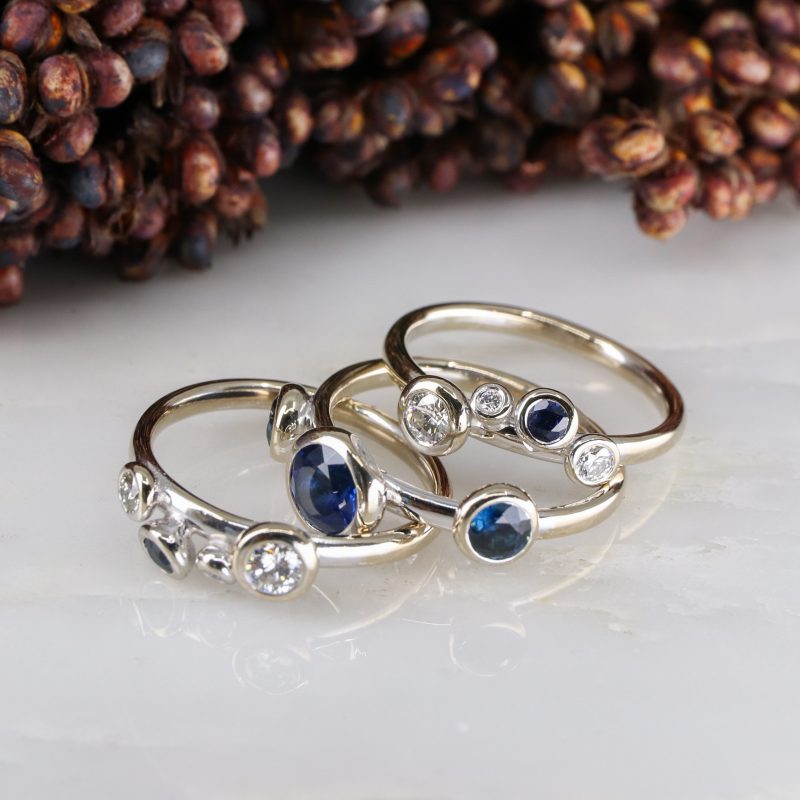 18ct white gold three part concentric ring with blue sapphires and white diamonds