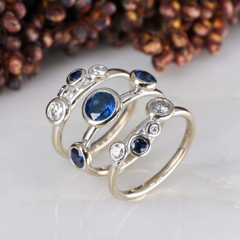 18ct white gold three part concentric ring with blue sapphires and white diamonds