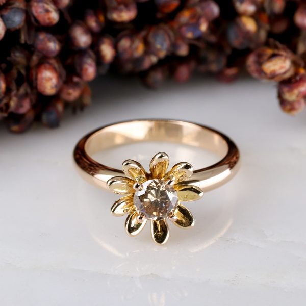 18ct rose gold and 0.50ct champagne diamond daisy ring