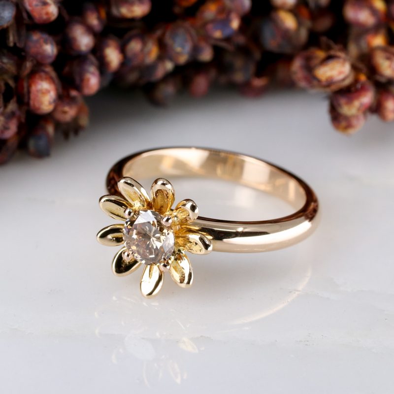 18ct rose gold and 0.50ct champagne diamond daisy ring