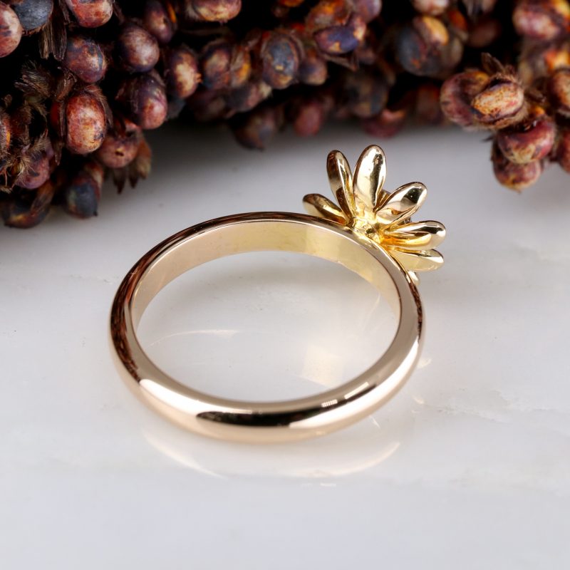 18ct rose gold and 0.50ct champagne diamond daisy ring