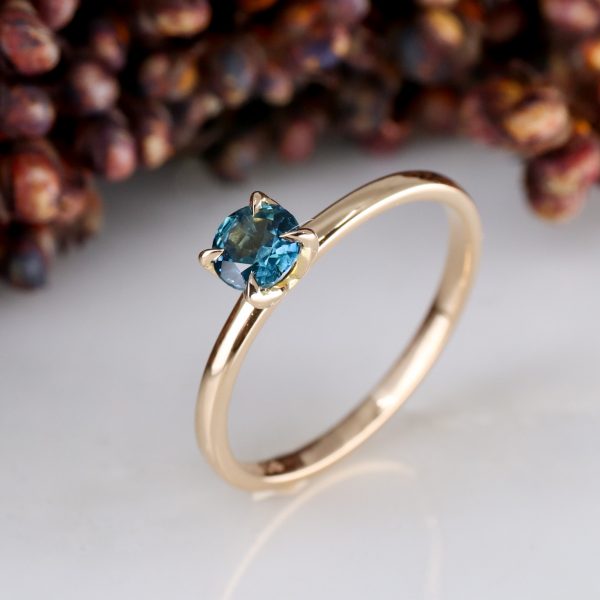 18ct rose gold tulip ring with 0.39ct teal sapphire