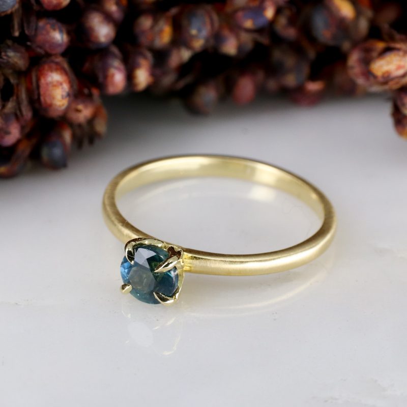 18ct yellow gold tulip ring with 0.66ct teal sapphire