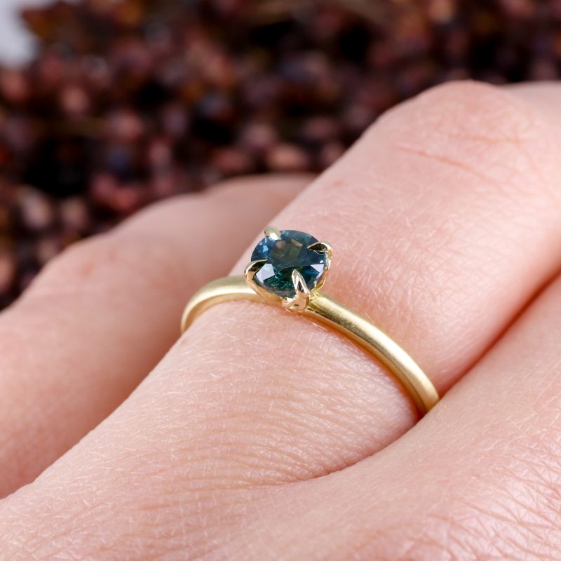 18ct yellow gold tulip ring with 0.66ct teal sapphire