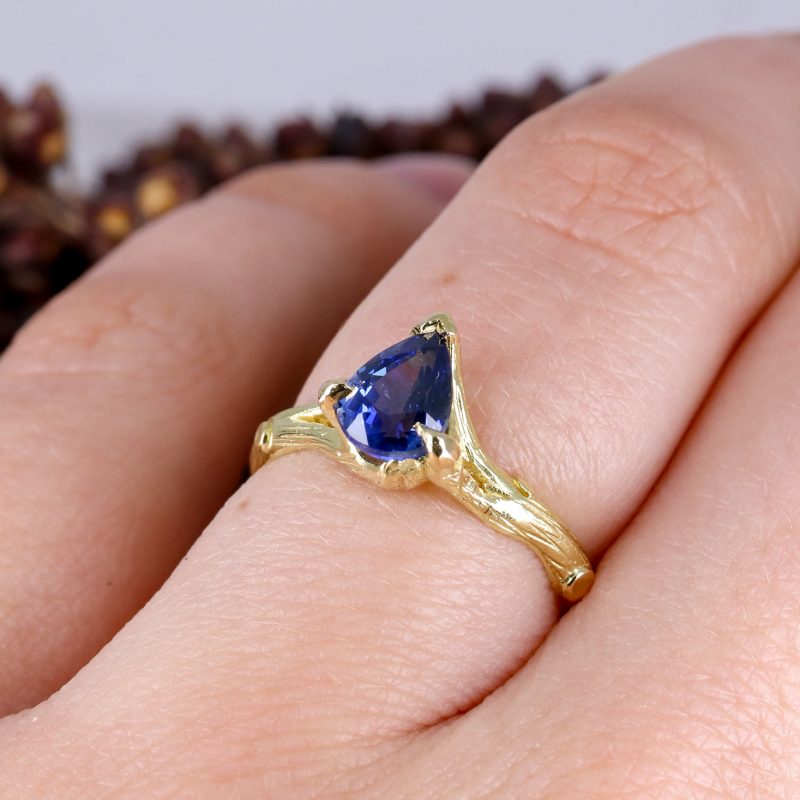 18ct yellow gold woodland ring with pear-shaped blue sapphire