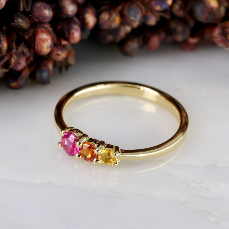 18ct fairtrade yellow gold triple sunset sapphire ring