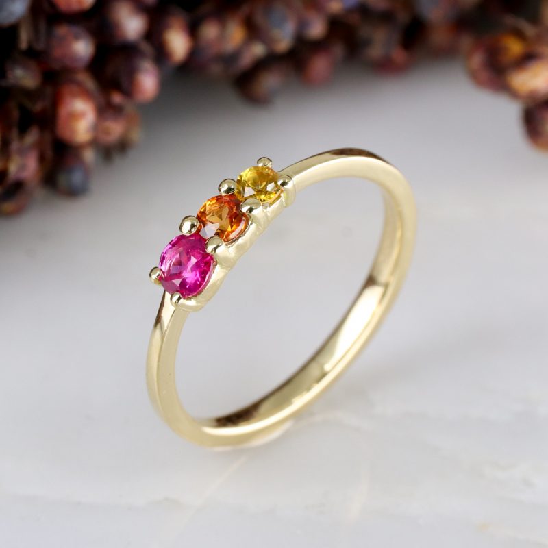 18ct fairtrade yellow gold triple sunset sapphire ring