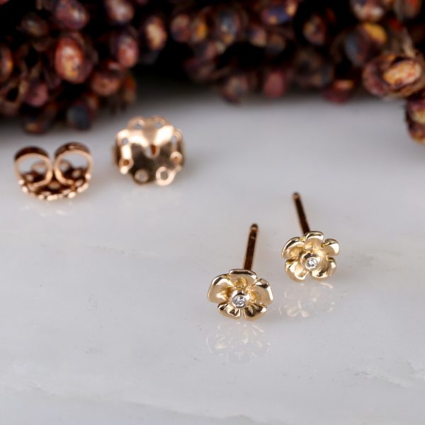 18ct rose gold tiny flower earstuds with white diamonds