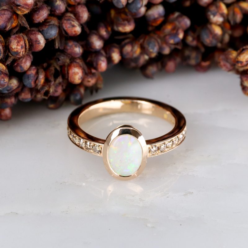 18ct rose gold opal ring with cinnamon diamond shoulders