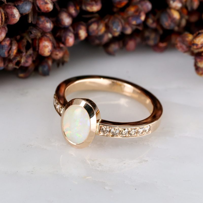 18ct rose gold opal ring with cinnamon diamond shoulders