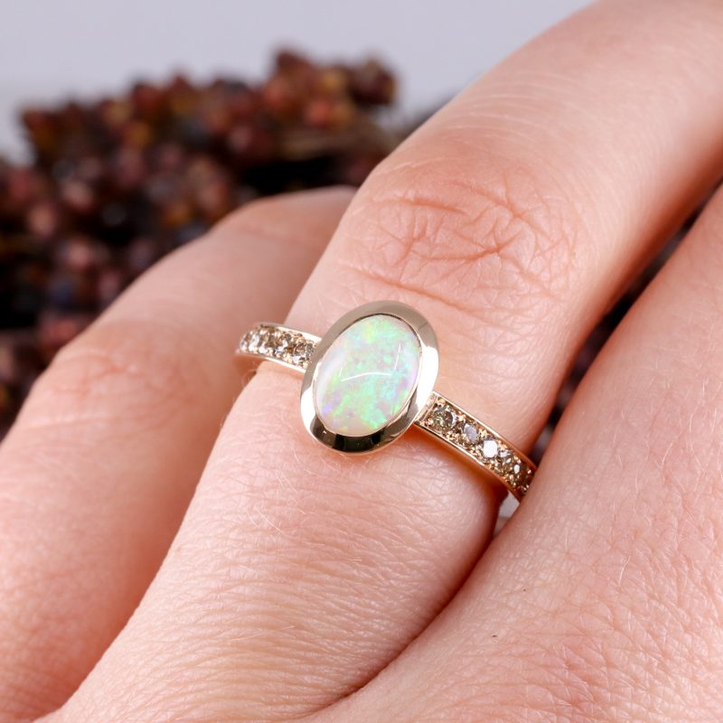 18ct rose gold opal ring with cinnamon diamond shoulders