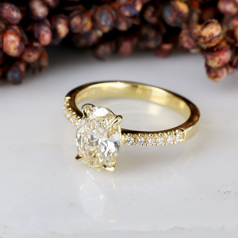 18ct yellow gold 1.51ct oval pale yellow diamond rise ring