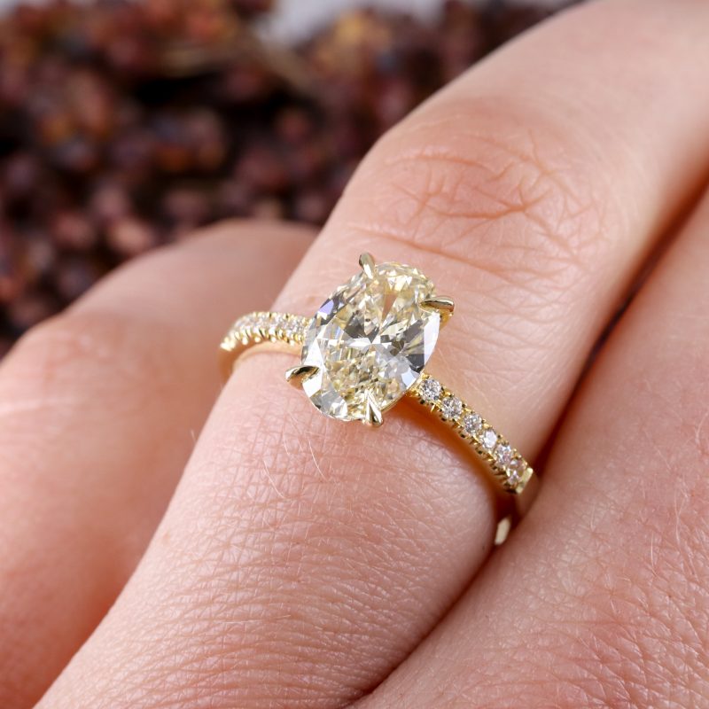 18ct yellow gold 1.51ct oval pale yellow diamond rise ring