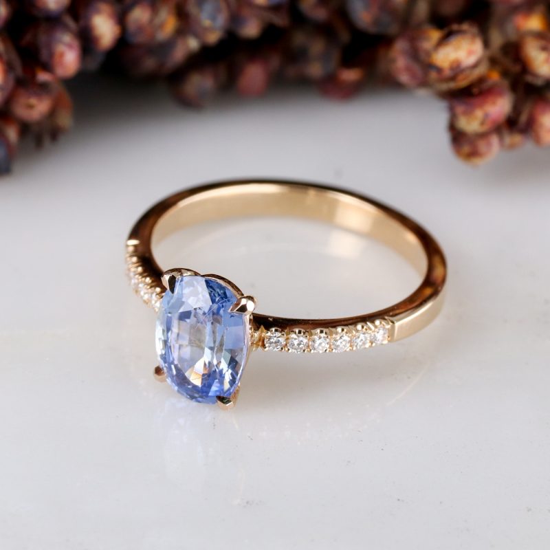 18ct rose gold cornflower blue sapphire rise ring with white diamond shoulders