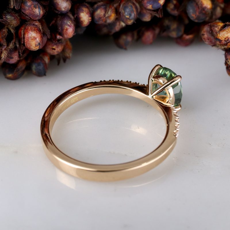 18ct rose gold seafoam coloured sapphire rise ring with white diamond shoulders