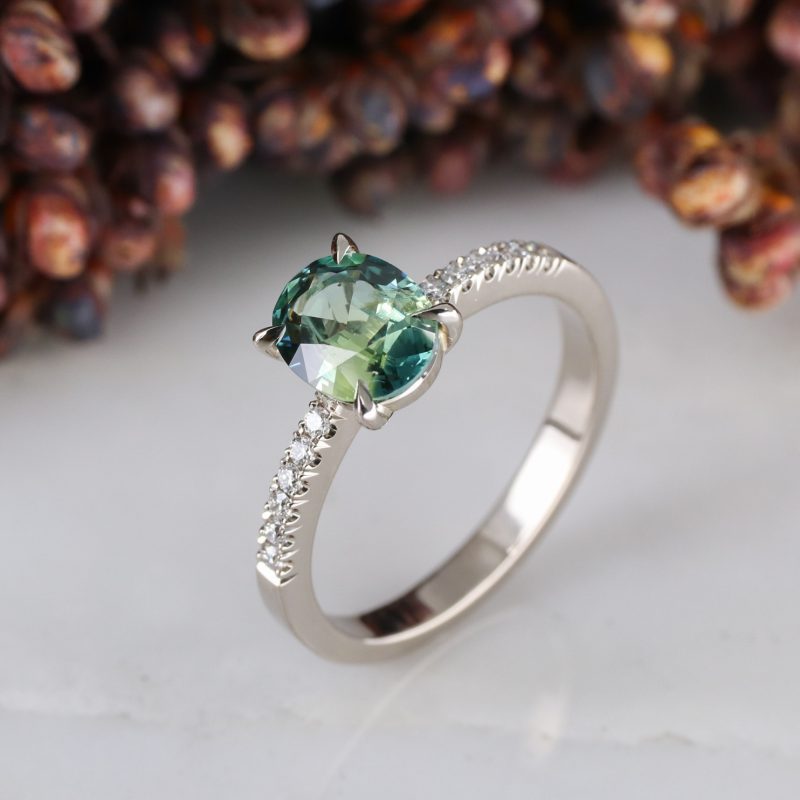 18ct white gold green sapphire rise ring with white diamond shoulders