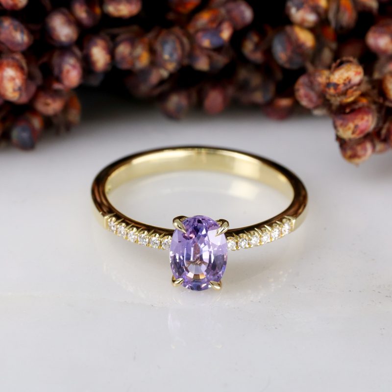 18ct yellow gold purple sapphire rise ring with white diamond shoulders