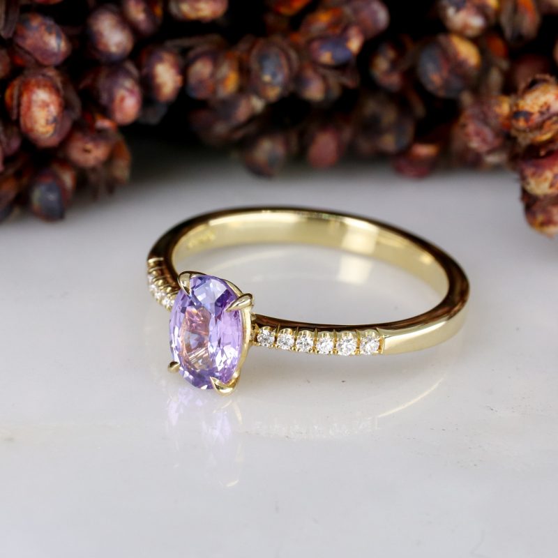 18ct yellow gold purple sapphire rise ring with white diamond shoulders