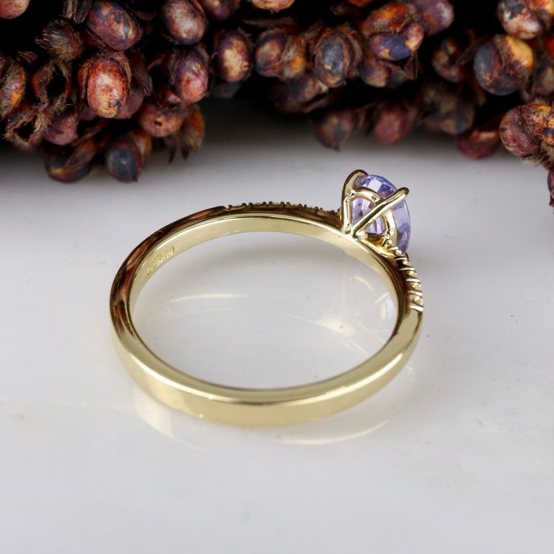 18ct yellow gold purple sapphire rise ring with white diamond shoulders