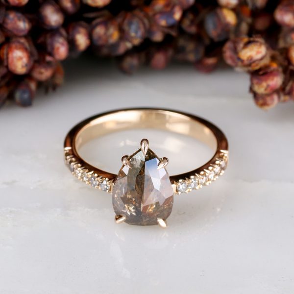 18ct rose gold unique pear shape diamond rise ring with ombre diamond shoulders