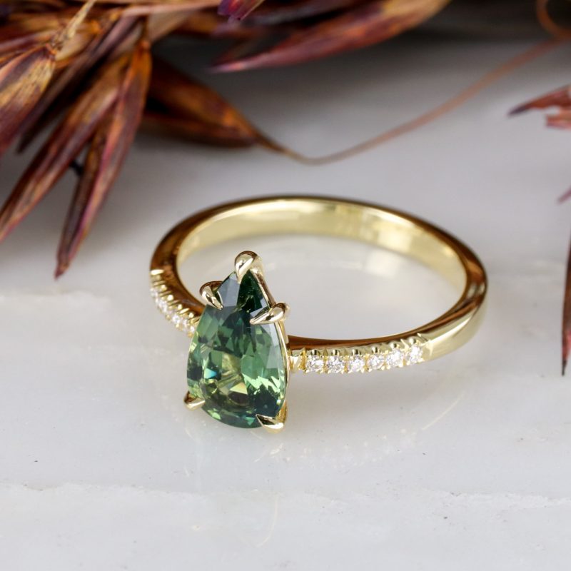 18ct yellow gold 1.70ct pear shape teal sapphire rise ring