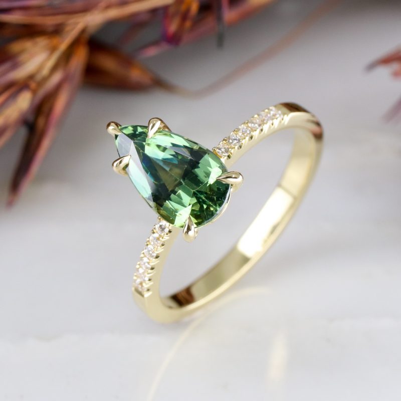 18ct yellow gold 1.70ct pear shape teal sapphire rise ring
