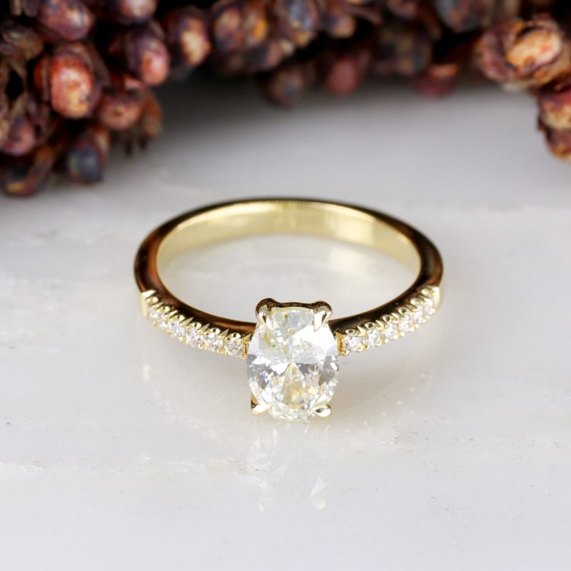 18ct yellow gold oval lab grown diamond rise ring with diamond shoulders